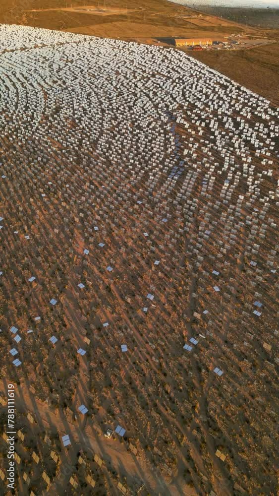 Aerial view of Ivanpah Solar Electric Plant in arid desert landscape, Nipton, California, United States. Aerial view of Ivanpah Solar Electric Plant in arid desert landscape, Nipton, California, United States.