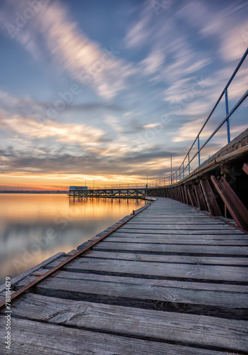 wooden bridge at sunset