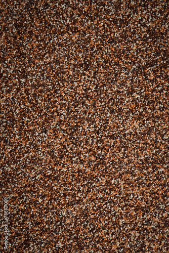 Brown sand background. Textured sand surface.