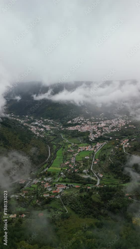 Aerial view of misty Manteigas, Guarda District, Portugal. Aerial view of misty Manteigas, Guarda District, Portugal.