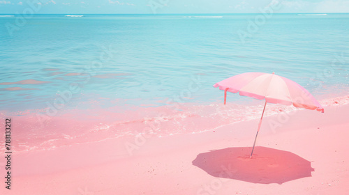 Umbrella on pink beach