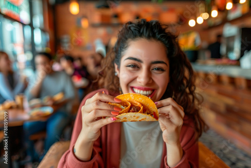 girl eating tacos