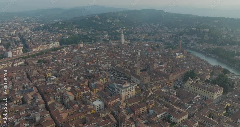 Aerial view of historic Verona with medieval architecture and terracotta rooftops, Veneto, Italy. Aerial view of historic Verona with medieval architecture and terracotta rooftops, Veneto, Italy.