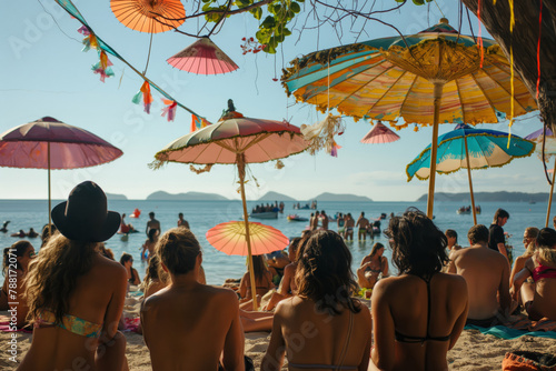 Summertime beachside music festival vibes with colorful umbrellas, live entertainment, and festive atmosphere for holidaymakers and leisure seekers photo