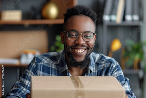 Smiling Man Holding Box