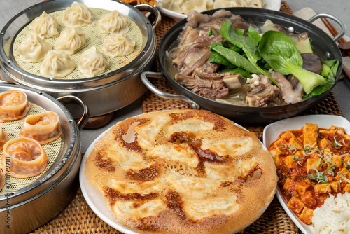 Korean food, shrimp, meat, dumplings, kimchi, xiaolongbao, mapa tofu rice, ribs, octopus, hot pot, side dishes, pickled radish