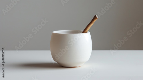 Clay bowl with pestle isolated on white background. Simple ceramic bowl