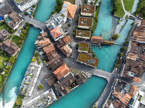 Interlaken, Switzerland: Aerial top down view of the Interlaken old town with the Aar river in Canton Bern in Switzerland.