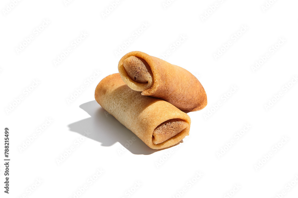 Stuffed crepes or blinis with filling, isolated on a white background - obrazy, fototapety, plakaty 