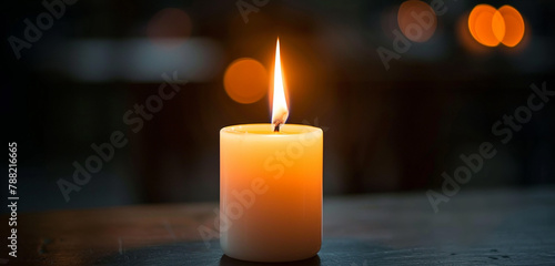 burning candle in the dark