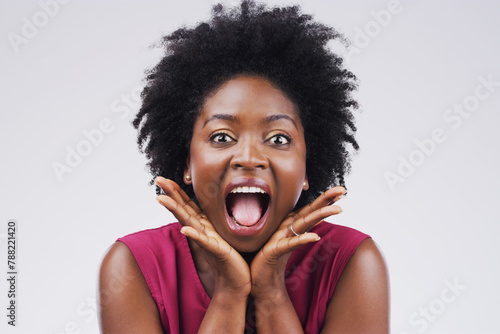 Black woman, portrait and wow in studio for winning competition, gossip or announcement by white background. Female person, shock and afro with omg reaction, mind blown and speechless for good news photo