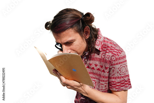 A blind man reading with a magnifying glass a book. concept of blindness problems
