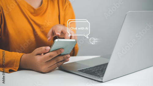 Fototapeta Naklejka Na Ścianę i Meble -  Woman hand use show a smartphone to type live chat, ask, answer with an artificial intelligence system. chatbot. Ai assistant.