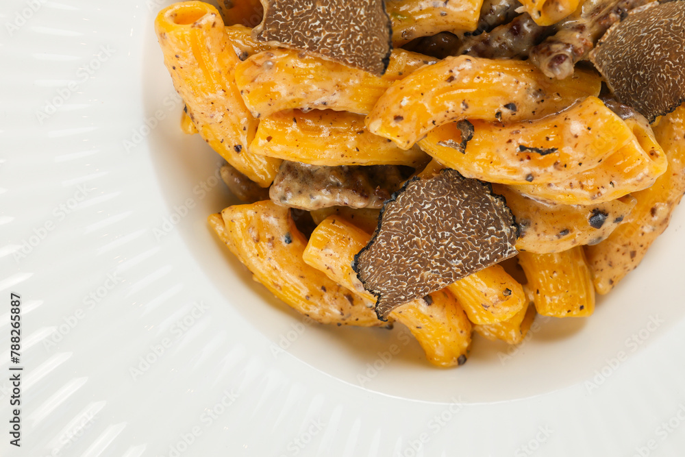 Truffle pastas. Close up photo with a gourmet dish made of truffles and other mushroom. Italian cuisine. Truffle pastas. Close up photo with a gourmet dish made of truffles and other mushroom. Italian cuisine.