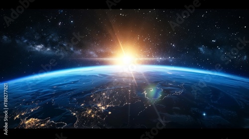 Sunrise over earth as seen from space. With stars background