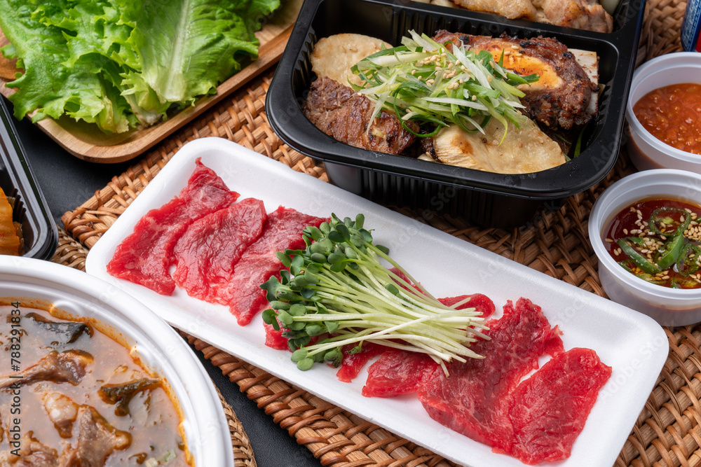 Korean food, Korean beef, beef sashimi, beef sashimi, raw pork belly, charcoal fire, seasoning, ribs, side dishes, galbitang, rice, kimchi, ssamjang, chili peppers, garlic, radish sprouts, lettuce Korean food, Korean beef, beef sashimi, beef sashimi, raw pork belly, charcoal fire, seasoning, ribs, side dishes, galbitang, rice, kimchi, ssamjang, chili peppers, garlic, radish sprouts, lettuce