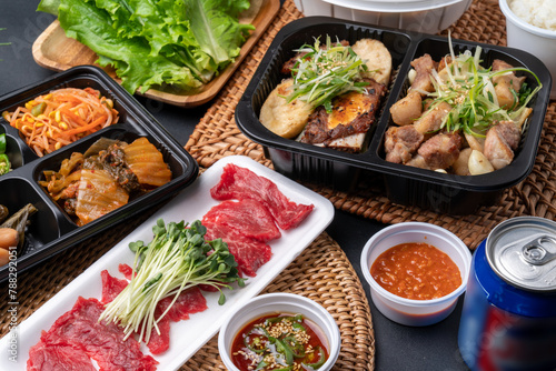 Korean food, Korean beef, beef sashimi, beef sashimi, raw pork belly, charcoal fire, seasoning, ribs, side dishes, galbitang, rice, kimchi, ssamjang, chili peppers, garlic, radish sprouts, lettuce