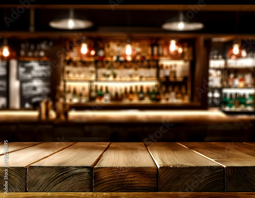 Wood table on blur of liquor cafe bar, coffee shop, bar, background  © Piyanat