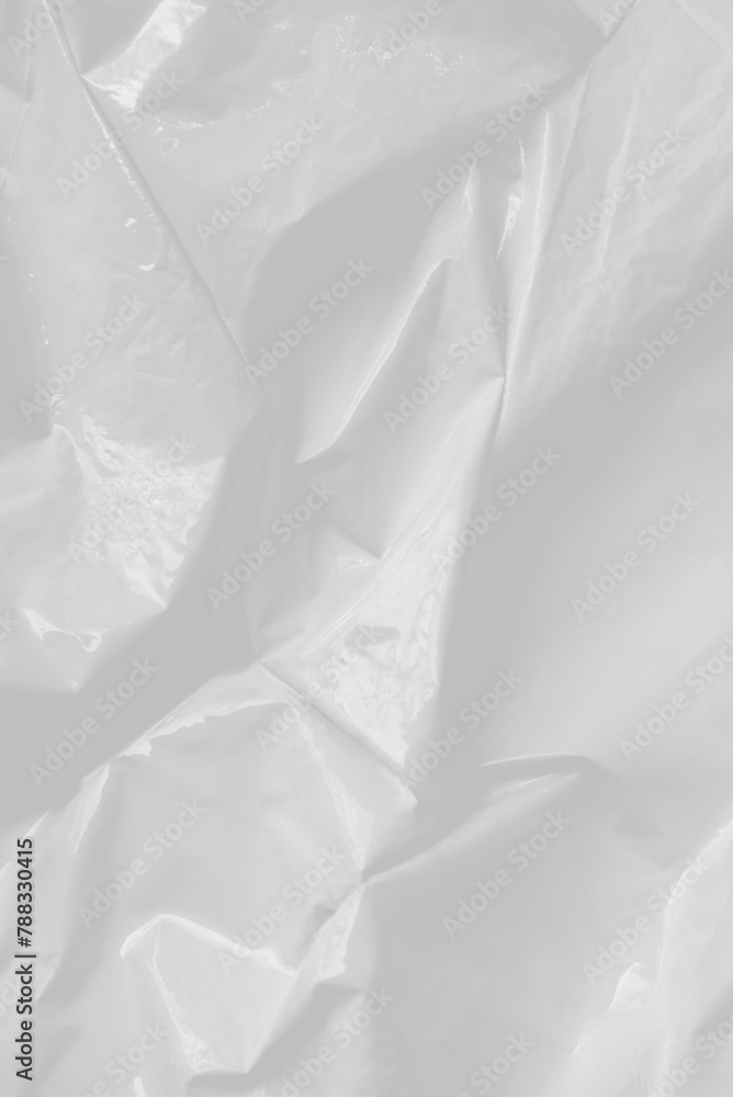 Obraz premium White crumpled plastic textured textile design element
