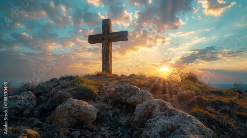 holy cross symbolizing the death and resurrection of jesus christ with the sky over golgotha hill is shrouded in light and cloudsimage