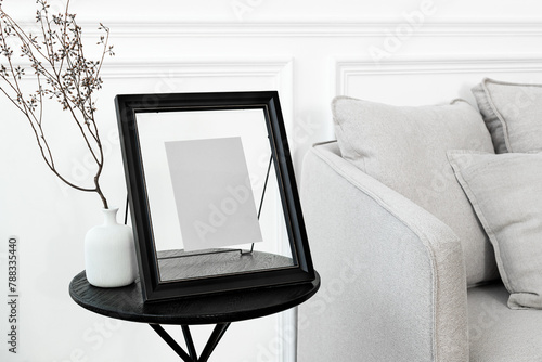 Picture frame png mockup in a minimal decor living room