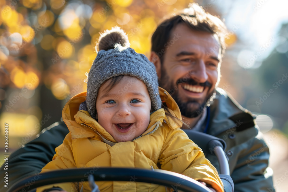 A dad joyously pushing his child in a buggy