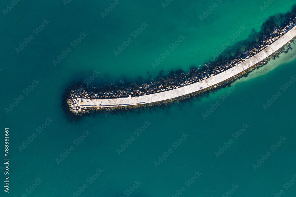 Obraz premium Aerial, nature and sea with footbridge in ocean, bay walk and coastal seaside or pedestrian pathway in summer. Outdoor, ecosystem for marine life and habitat for biology, top view in Mauritius