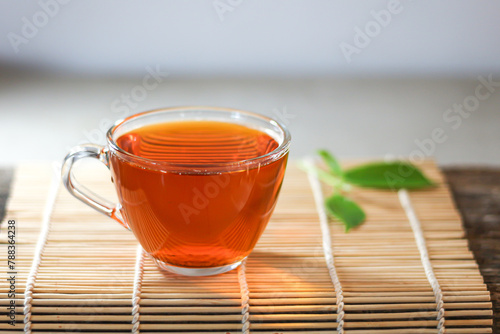 Put hot tea on old wooden.concept photo of beverage.