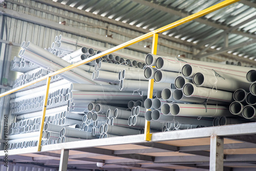 PVC pipes stacked in warehouse. High quality photo