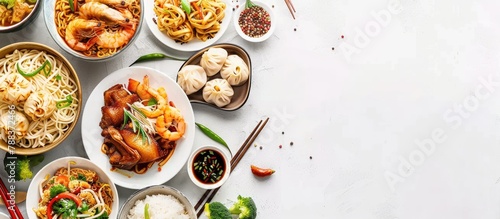 Chinese cuisine dishes on a white backdrop. Including Chinese noodles, stir-fried rice, dumplings, Peking duck, dim sum, and spring rolls. A collection of well-known Chinese dishes.