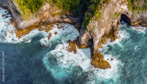 Aerial view of sea waves and fantastic Rocky coast; tropical paradise with ocean lagoon