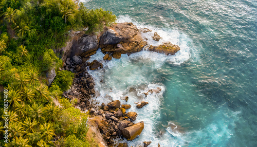 Aerial view of sea waves and fantastic Rocky coast; tropical paradise with ocean lagoon