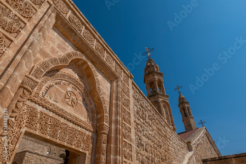 Mardin Midyat district Mor Gabriel Monastery unique architectural detail photographs taken with blue sky photo