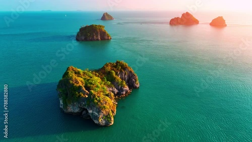 Aerial view of a small secluded tropical island in Thailand.  photo
