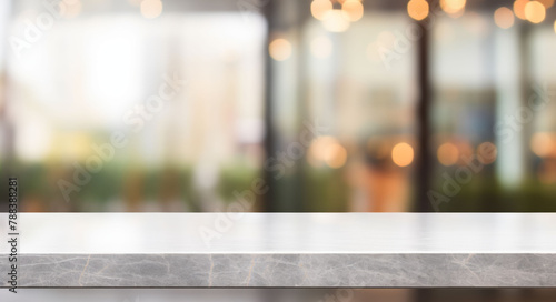 White stone marble table top and blurred abstract background from interior building banner background - can used for display or montage your products.