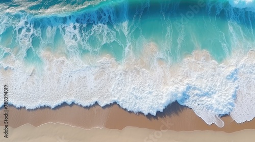 Beautiful natural summer vacation background. Aerial top view drone shot of turquoise waves breaking white bubbles on pristine white sand © RBGallery