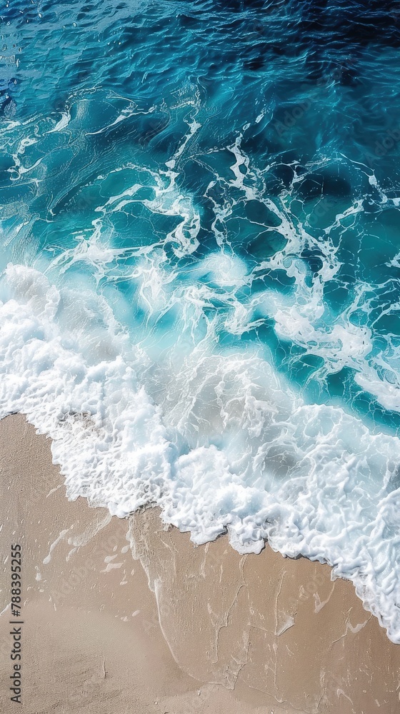 Beautiful natural summer vacation background. Aerial top view drone shot of turquoise waves breaking white bubbles on pristine white sand Beautiful natural summer vacation background. Aerial top view drone shot of turquoise waves breaking white bubbles on pristine white sand