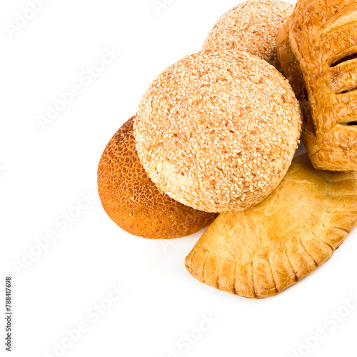 Pastries, buns and bread Isolated on a white . There is free space for text.
