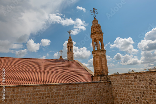 Mardin Midyat district Mor Gabriel Monastery unique architectural detail photographs taken with blue sky photo