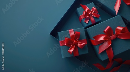 Blue gift box with red ribbon