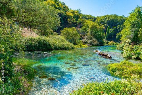 Turquoise and green water in the spring water of the blue eye lake in Albania.