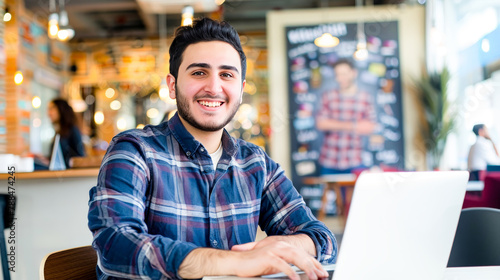 A young Muslim entrepreneur at a co-working space, blending modern business practices with traditional ethical values.