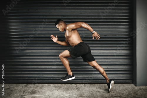 Shirtless, black man or sprint at speed, fitness or vision of exercise, energy or thinking of health. Fast, muscular or male runner as planning, idea or dream of cardio, training or power performance