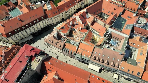 Ancient Structures On Old Town Street In Bratislava, Slovakia aerial drone view. Bratislava city skyline in 4K. Cityscape in Background. High aerial drone view of Bratislava city photo