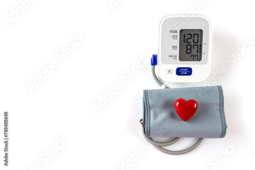 tonometer and red heart on a white background with copy space.