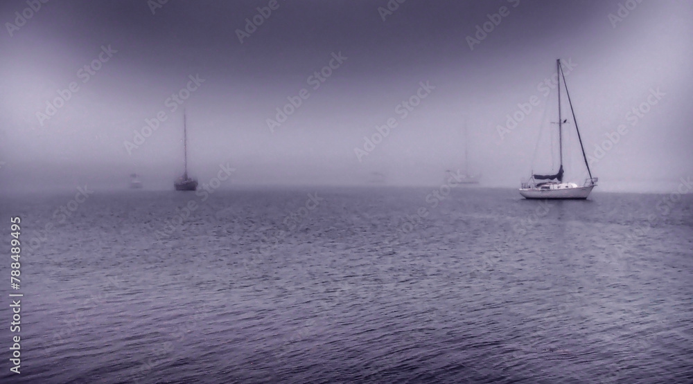 Sailboat at sunrise - foggy morning. Captured in Tierra Verde, Florida by Christy Mandeville