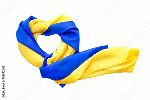 National flag of Ukraine in form of heart. Fabric curved flag in yellow-blue colors in heart-shaped on white background. Top shot, isolation.