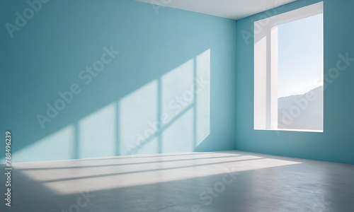light blue empty room with window and sun rays coming through window  photo