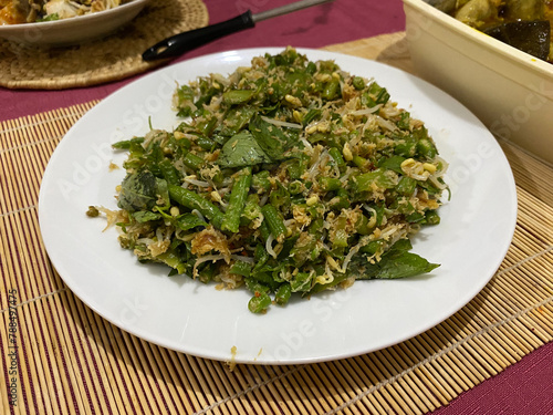 traditional salad urap on a plate from indonesia photo