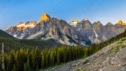 Epic panorama view at sunrise of scenic alpine landscape of The Valley of the 10 Peaks in the Rocky Mountains of Banff National Park, Alberta, Canada. photo